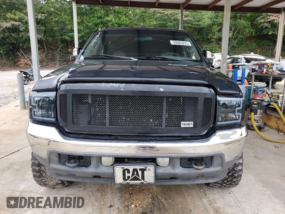 2004 Ford F-250 XL with VIN 1FTNW21P94EC60823, listed as a Copart auction lot 59985235 with 271,459 mi miles and Salvage title. Bid and sale history available at DreamBid. Image 5.