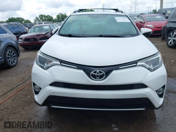 2016 Toyota RAV4 XLE with VIN 2T3RFREV8GW450273, listed as a IAAI auction lot 42281091 with 75,478 mi miles and . Bid and sale history available at DreamBid. Image 12.