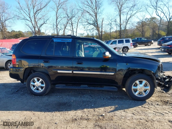 2005 GMC Envoy SLE with VIN 1GKDS13S152246568, listed as a IAAI auction lot 41293887 with 315,882 mi miles. Bid and sale history available at carsss.com. Image 13.