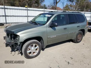 2004 GMC Envoy SLE with VIN 1GKDS13S542324252, listed as a Copart auction lot 48667895 with 206,206 mi miles and Salvage Title. Bid and sale history available at carsss.com. Image 1.