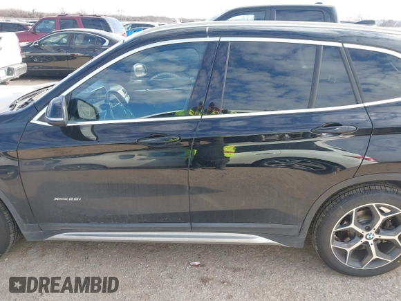 2016 BMW X1 xDrive28i with VIN WBXHT3Z3XG4A48557, listed as a IAAI auction lot 41387960 with 84,821 mi miles. Bid and sale history available at carsss.com. Image 14.