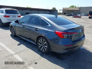 2023 Honda Civic EX with VIN 2HGFE1F74PH323979, listed as a IAAI auction lot 42499373 with 70,326 mi miles and . Bid and sale history available at DreamBid. Image 3.