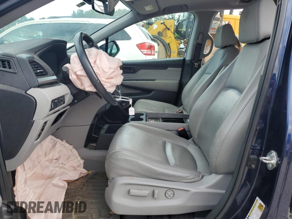2019 Honda Odyssey Touring z VIN 5FNRL6H8XKB027156, wystawiony jako Copart lot #60735455 z przebiegiem 100 044 mil mil oraz Szkoda całkowita • Salvage title. Historia ofert i sprzedaży dostępna na DreamBid. Obrazek 7.