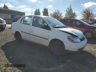 2002 Toyota ECHO with VIN JTDBT123020215409, listed as a Copart auction lot 71653384 with 265,969 mi miles and Salvage Title. Bid and sale history available at carsss.com. Image 4.