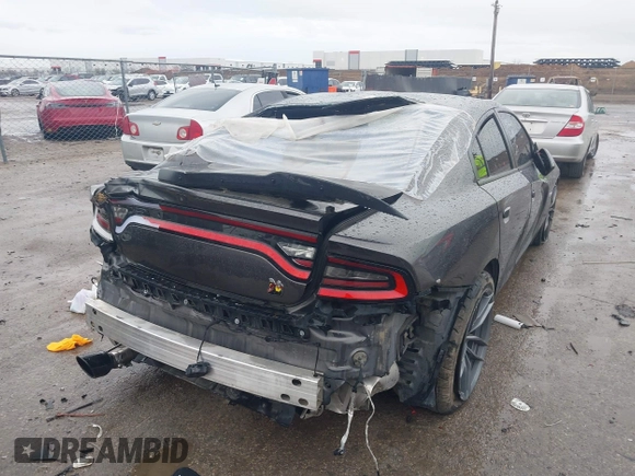 2020 Dodge Charger Scat Pack z VIN 2C3CDXGJXLH107344, wystawiony jako IAAI lot #41888453 z przebiegiem Nie podano mil oraz . Historia ofert i sprzedaży dostępna na DreamBid. Obrazek 4.