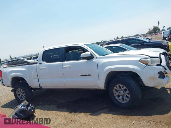 2017 Toyota Tacoma SR5 with VIN 3TMBZ5DN3HM008801, listed as a IAAI auction lot 42660672 with 132,871 mi miles and . Bid and sale history available at DreamBid. Image 12.