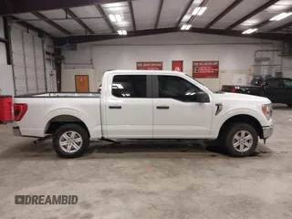 2021 Ford F-150 XL with VIN 1FTEW1C57MFA71572, listed as a IAAI auction lot 41549588 with 82,389 mi miles and . Bid and sale history available at carsss.com. Image 14.