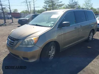 2008 Honda Odyssey EX-L with VIN 5FNRL38768B405469, listed as a IAAI auction lot 42142011 with 132,362 mi miles. Bid and sale history available at carsss.com. Image 2.