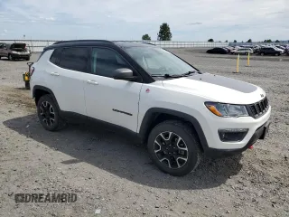 2020 Jeep Compass Trailhawk with VIN 3C4NJDDB5LT195235, listed as a Copart auction lot 62344635 with 65,378 mi miles and Salvage title. Bid and sale history available at DreamBid. Image 4.