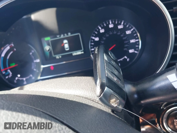 2015 Kia Optima Hybrid with VIN KNAGM4AD2F5082642, listed as a IAAI auction lot 39434717 with 131,000 mi miles. Bid and sale history available at carsss.com. Image 11.