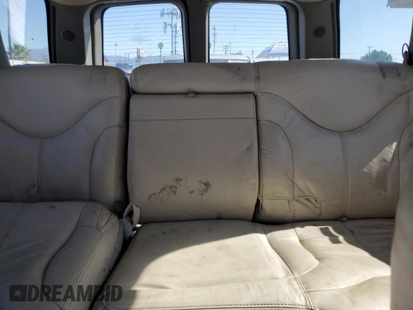 2001 GMC Yukon SLT z VIN 1GKEC13T21J264040, wystawiony jako Copart lot #46282145 z przebiegiem 136 264 mil mil oraz Szkoda całkowita • Salvage title. Historia ofert i sprzedaży dostępna na DreamBid. Obrazek 10.