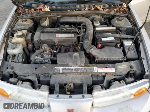2001 Saturn SL z VIN 1G8ZK52761Z204012, wystawiony jako Copart lot #86618384 z przebiegiem 99 674 mil mil oraz Szkoda całkowita • Salvage title. Historia ofert i sprzedaży dostępna na DreamBid. Obrazek 11.