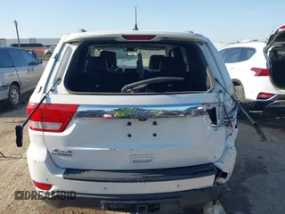 2011 Jeep Grand Cherokee Laredo with VIN 1J4RR4GG4BC703071, listed as a IAAI auction lot 41992878 with 126,199 mi miles and . Bid and sale history available at DreamBid. Image 16.