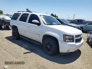 2011 Chevrolet Tahoe LT with VIN 1GNSCBE07BR401636, listed as a Copart auction lot 56075475 with 203,830 mi miles and Salvage title. Bid and sale history available at DreamBid. Image 4.