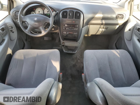 2005 Dodge Caravan SXT with VIN 1D4GP45R95B419486, listed as a Copart auction lot 60313045 with 180,615 mi miles and Salvage title. Bid and sale history available at DreamBid. Image 8.