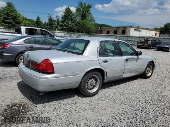 2000 Mercury Grand Marquis LS z VIN 2MEFM75W8YX614309, wystawiony jako Copart lot #61229915 z przebiegiem 228 527 mil mil oraz Szkoda całkowita • Salvage title. Historia ofert i sprzedaży dostępna na DreamBid. Obrazek 3.