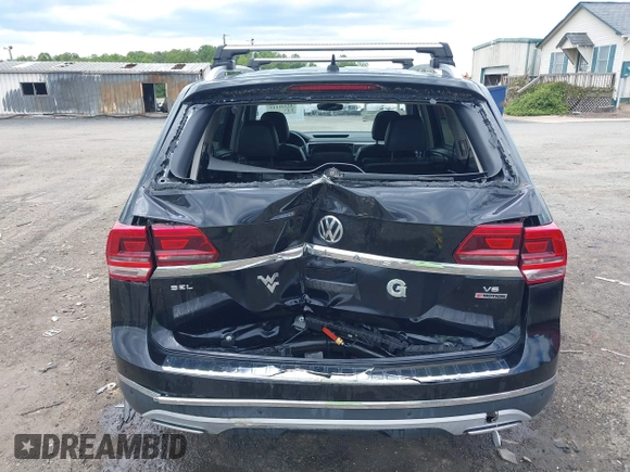 2018 Volkswagen Atlas SEL z VIN 1V2MR2CA2JC516351, wystawiony jako IAAI lot #42341113 z przebiegiem 135 077 mil mil oraz . Historia ofert i sprzedaży dostępna na DreamBid. Obrazek 16.