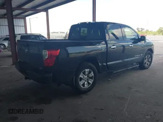 2018 Nissan Titan SV with VIN 1N6AA1E63JN512230, listed as a IAAI auction lot 42000705 with 64,479 mi miles and . Bid and sale history available at DreamBid. Image 4.
