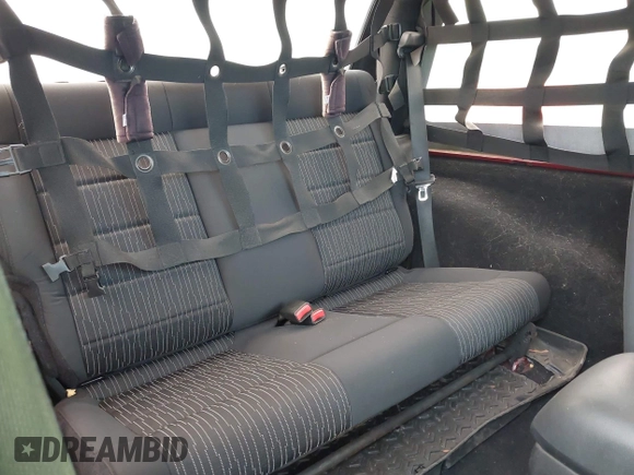 2012 Jeep Wrangler Sport with VIN 1C4AJWAG3CL197295, listed as a IAAI auction lot 42349118 with 117,381 mi miles and . Bid and sale history available at DreamBid. Image 8.