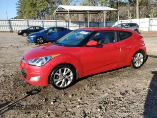2017 Hyundai Veloster with VIN KMHTC6AD2HU322311, listed as a Copart auction lot 86637864 with 127,604 mi miles and Salvage Title. Bid and sale history available at carsss.com. Image 1.