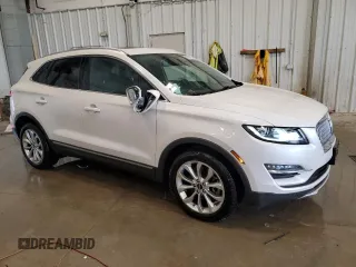 2019 Lincoln MKC Select with VIN 5LMCJ2D90KUL25654, listed as a Copart auction lot 56461185 with 56,296 mi miles and Salvage title. Bid and sale history available at DreamBid. Image 4.