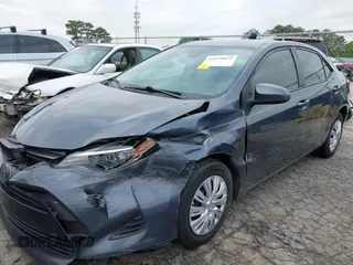 2019 Toyota Corolla L with VIN 5YFBURHE8KP936426, listed as a IAAI auction lot 42029018 with 190,163 mi miles and . Bid and sale history available at DreamBid. Image 6.