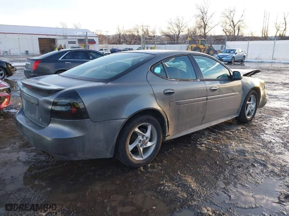 2004 Pontiac Grand Prix GTP with VIN 2G2WR524041363510, listed as a IAAI auction lot 41334336 with 187,802 mi miles. Bid and sale history available at carsss.com. Image 4.
