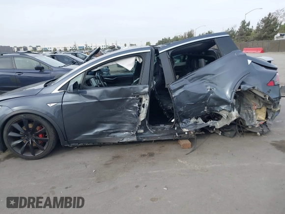 2016 Tesla Model X 70D with VIN 5YJXCAE27GF015175, listed as a IAAI auction lot 41074929 with 115,130 mi miles. Bid and sale history available at carsss.com. Image 6.