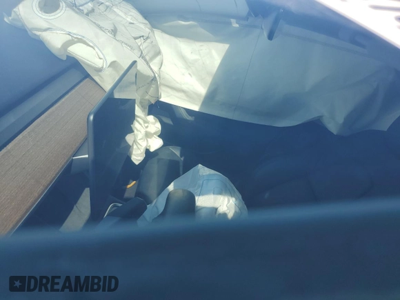 2022 Tesla Model 3 Long Range with VIN 5YJ3E1EB6NF249443, listed as a Copart auction lot 42940215 with Not Provided miles and Salvage Title. Bid and sale history available at DreamBid. Image 8.