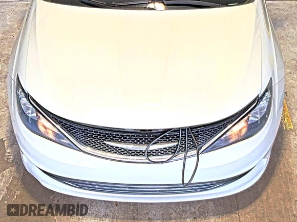 2017 Chrysler Pacifica Touring with VIN 2C4RC1DG5HR764942, listed as a IAAI auction lot 42255421 with 64,381 mi miles and . Bid and sale history available at DreamBid. Image 8.