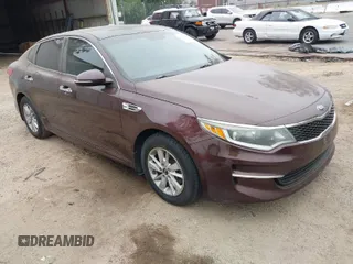 2016 Kia Optima LX with VIN 5XXGT4L30GG075759, listed as a IAAI auction lot 42024856 with 113,740 mi miles. Bid and sale history available at carsss.com. Image 1.