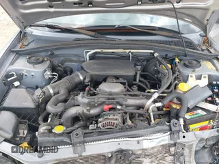 2005 Subaru Forester XS with VIN JF1SG65615G755098, listed as a IAAI auction lot 42183497 with 205,983 mi miles and . Bid and sale history available at DreamBid. Image 10.
