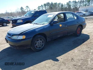 1999 Nissan Altima XE with VIN 1N4DL01D0XC116467, listed as a IAAI auction lot 41705684 with 227,999 mi miles. Bid and sale history available at carsss.com. Image 2.