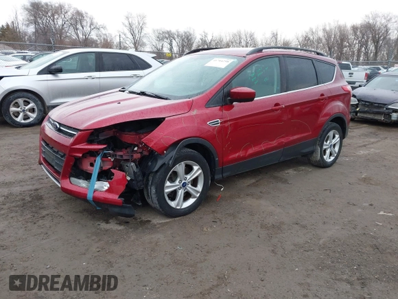 2014 Ford Escape SE with VIN 1FMCU9GX7EUC35483, listed as a IAAI auction lot 41704298 with 105,017 mi miles. Bid and sale history available at carsss.com. Image 2.