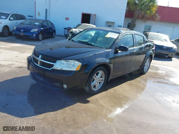 2010 Dodge Avenger R/T with VIN 1B3CC5FB7AN114240, listed as a IAAI auction lot 41694017 with 210,609 mi miles. Bid and sale history available at carsss.com. Image 2.