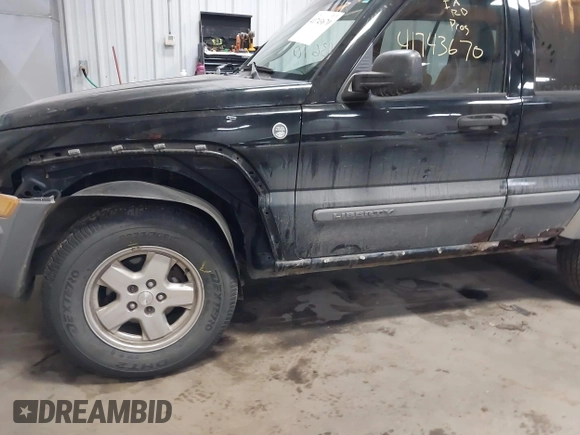 2005 Jeep Liberty Sport with VIN 1J4GL48K55W711355, listed as a IAAI auction lot 41743670 with 226,160 mi miles and . Bid and sale history available at carsss.com. Image 6.