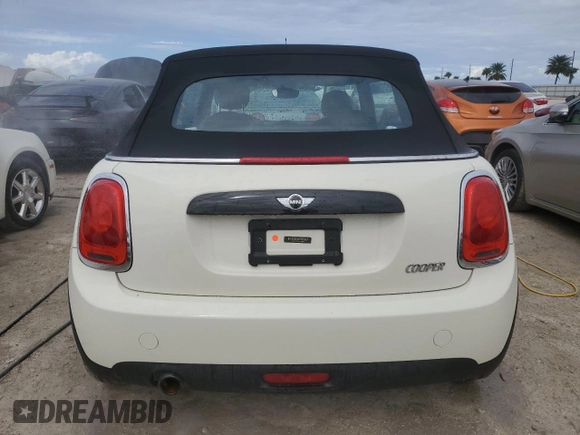 2017 MINI Convertible Cooper z VIN WMWWG5C38H3C99627, wystawiony jako Copart lot #75053914 z przebiegiem 42 087 mil mil oraz Nie do naprawy • Non repairable. Historia ofert i sprzedaży dostępna na DreamBid. Obrazek 6.