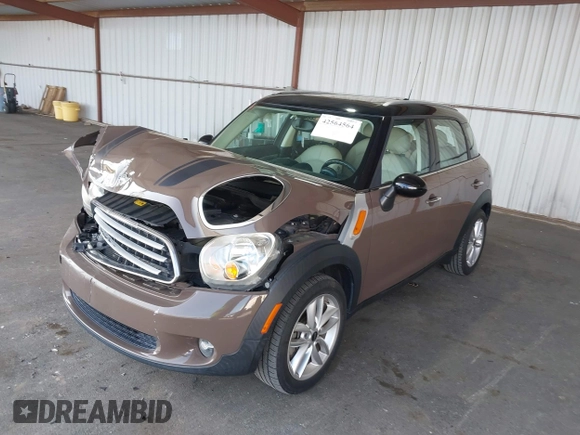 2012 MINI Countryman with VIN WMWZB3C51CWM04563, listed as a IAAI auction lot 42564564 with 95,760 mi miles and . Bid and sale history available at DreamBid. Image 17.