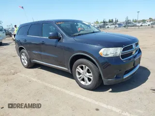 2013 Dodge Durango SXT with VIN 1C4RDJAG4DC677831, listed as a IAAI auction lot 42010994 with 172,448 mi miles. Bid and sale history available at carsss.com. Image 1.