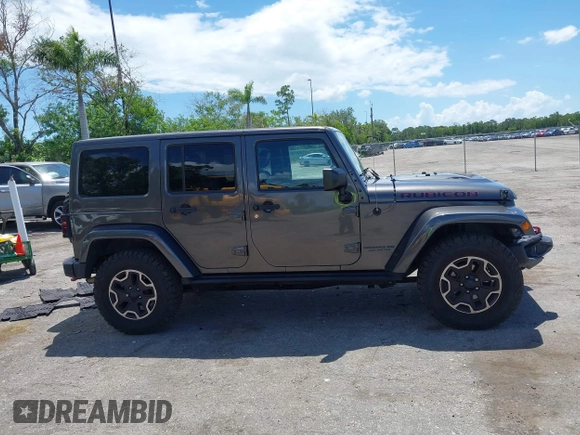2017 Jeep Wrangler Unlimited Rubicon Recon with VIN 1C4HJWFG2HL560846, listed as a IAAI auction lot 42532745 with 101,285 mi miles and . Bid and sale history available at DreamBid. Image 13.