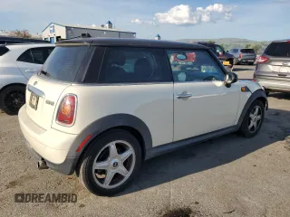 2010 MINI Hardtop with VIN WMWMF3C52ATZ65593, listed as a Copart auction lot 50107445 with 105,389 mi miles and Salvage title. Bid and sale history available at DreamBid. Image 3.