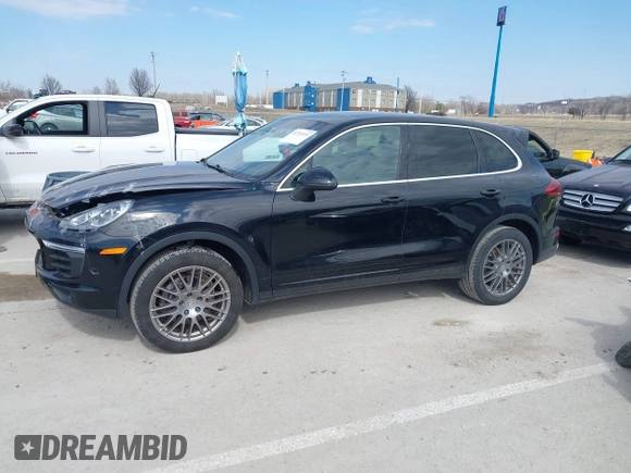 2016 Porsche Cayenne with VIN WP1AA2A25GKA15765, listed as a IAAI auction lot 41715331 with 90,259 mi miles. Bid and sale history available at carsss.com. Image 15.