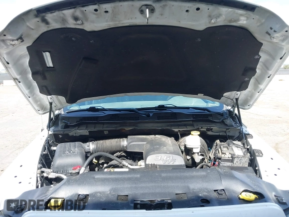 2018 Ram 1500 Tradesman z VIN 1C6RR6FG3JS341748, wystawiony jako IAAI lot #41764375 z przebiegiem 181 986 mil mil oraz . Historia ofert i sprzedaży dostępna na DreamBid. Obrazek 10.