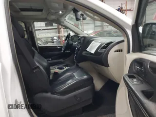 2014 Chrysler Town & Country Limited with VIN 2C4RC1GG7ER178802, listed as a IAAI auction lot 41863918 with 103,777 mi miles and . Bid and sale history available at DreamBid. Image 5.