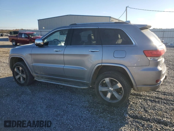 2014 Jeep Grand Cherokee Overland with VIN 1C4RJFCG0EC226397, listed as a Copart auction lot 80295784 with 131,921 mi miles and Salvage Title. Bid and sale history available at DreamBid. Image 2.