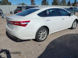 2015 Toyota Avalon Limited with VIN 4T1BK1EB9FU191692, listed as a IAAI auction lot 41519160 with 165,371 mi miles and . Bid and sale history available at DreamBid. Image 4.