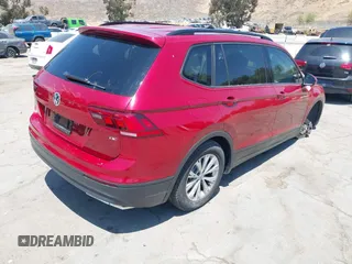 2018 Volkswagen Tiguan S with VIN 3VV1B7AX4JM043324, listed as a IAAI auction lot 42623550 with 62,858 mi miles and . Bid and sale history available at DreamBid. Image 4.