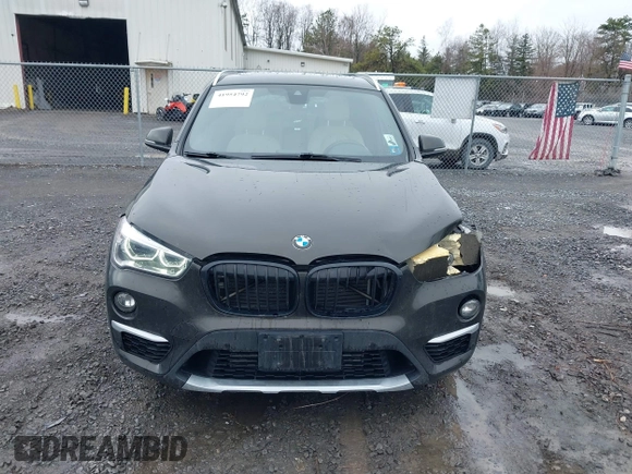 2018 BMW X1 xDrive28i with VIN WBXHT3C34J5K31430, listed as a IAAI auction lot 41954792 with 125,447 mi miles. Bid and sale history available at carsss.com. Image 12.