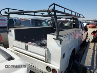 2022 Chevrolet Silverado 1500 with VIN 1GC2WLE7XNF219440, listed as a Copart auction lot 49656895 with 128,138 mi miles and Salvage Title. Bid and sale history available at DreamBid. Image 3.
