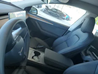 2024 Tesla Model Y с VIN 7SAYGDED5RF086456, выставлен на аукционе Copart как лот 57994835 с пробегом Не указан миль и Списание • Salvage title. История ставок и продаж доступна на DreamBid. Изображение 9.